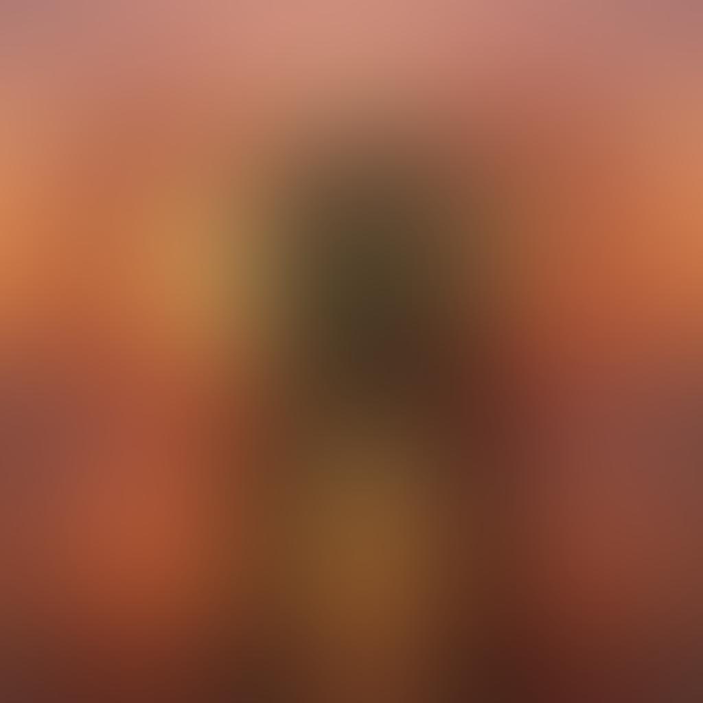 A soft, intimate scene featuring two intertwined silhouettes against a glowing sunset, with hints of red and gold symbolizing passion. Delicate petals scattered around, suggesting romance and tenderness, while a shadowy heart shape subtly forms in the background. The overall atmosphere radiates warmth and allure, inviting the viewer to explore the depths of intimacy. super-realistic. warm colors. soft focus.